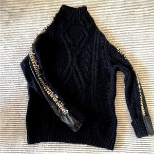 Unique high neck embellished sweater
